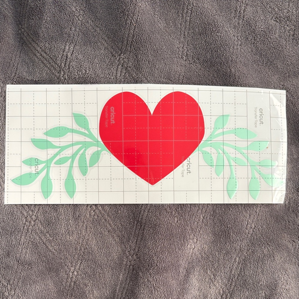Vibrant Red Heart with Green Leaves Sticker